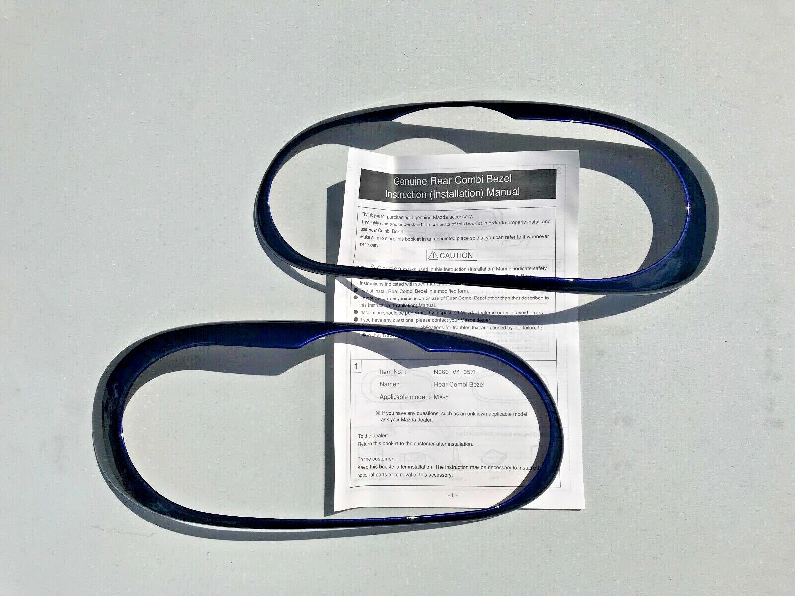 01 - 05 Mazda Miata tail light covers combi trim Strato Blue OEM NEW Genuine 01 - 05 Mazda Miata tail light covers combi trim Strato Blue OEM NEW Genuine