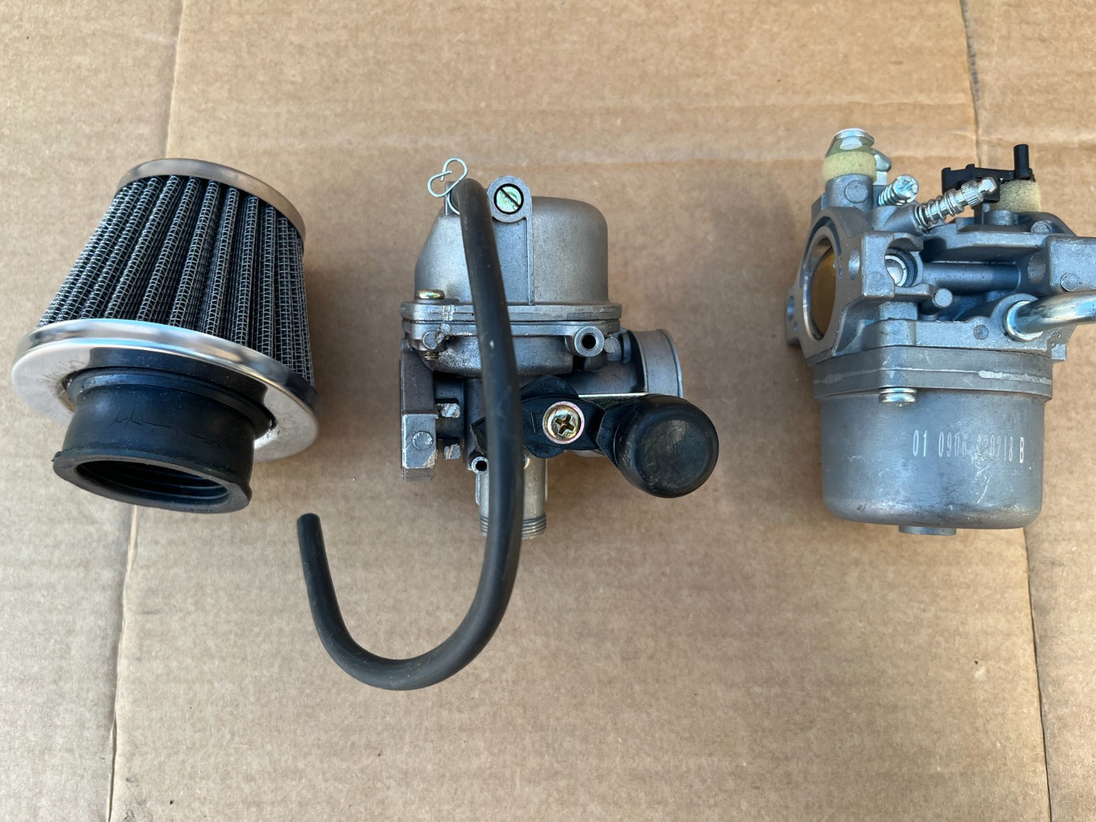 two small carburetors
