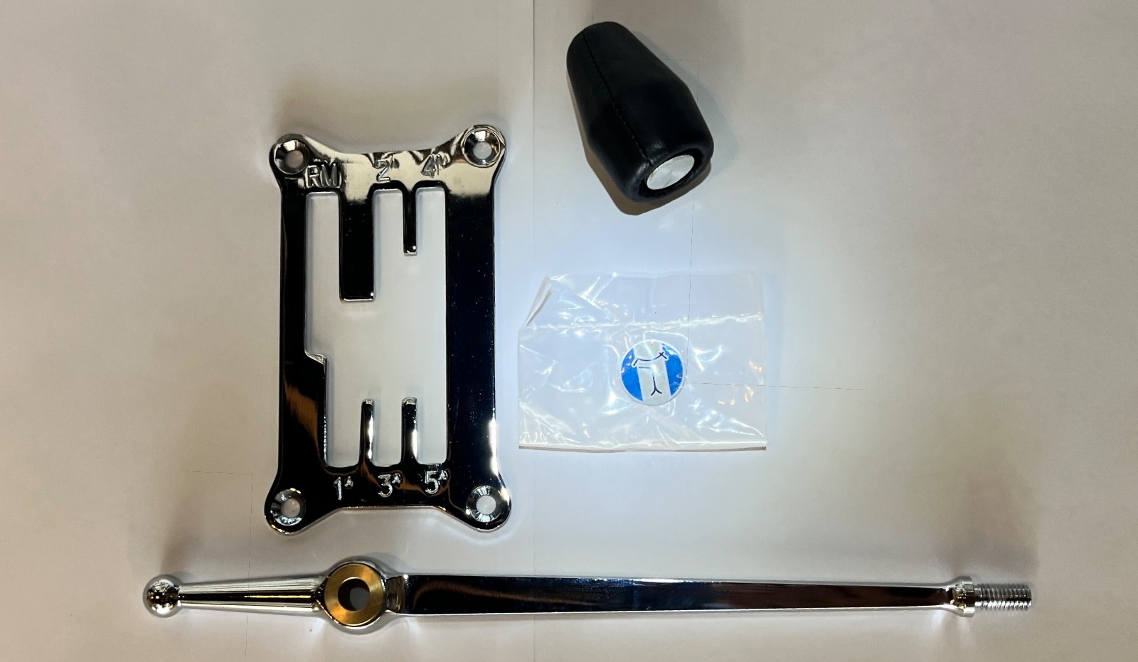 DeTomaso Pantera Parts - Shift Gate, Rod, Knob, and Emblem - Set of Four Parts