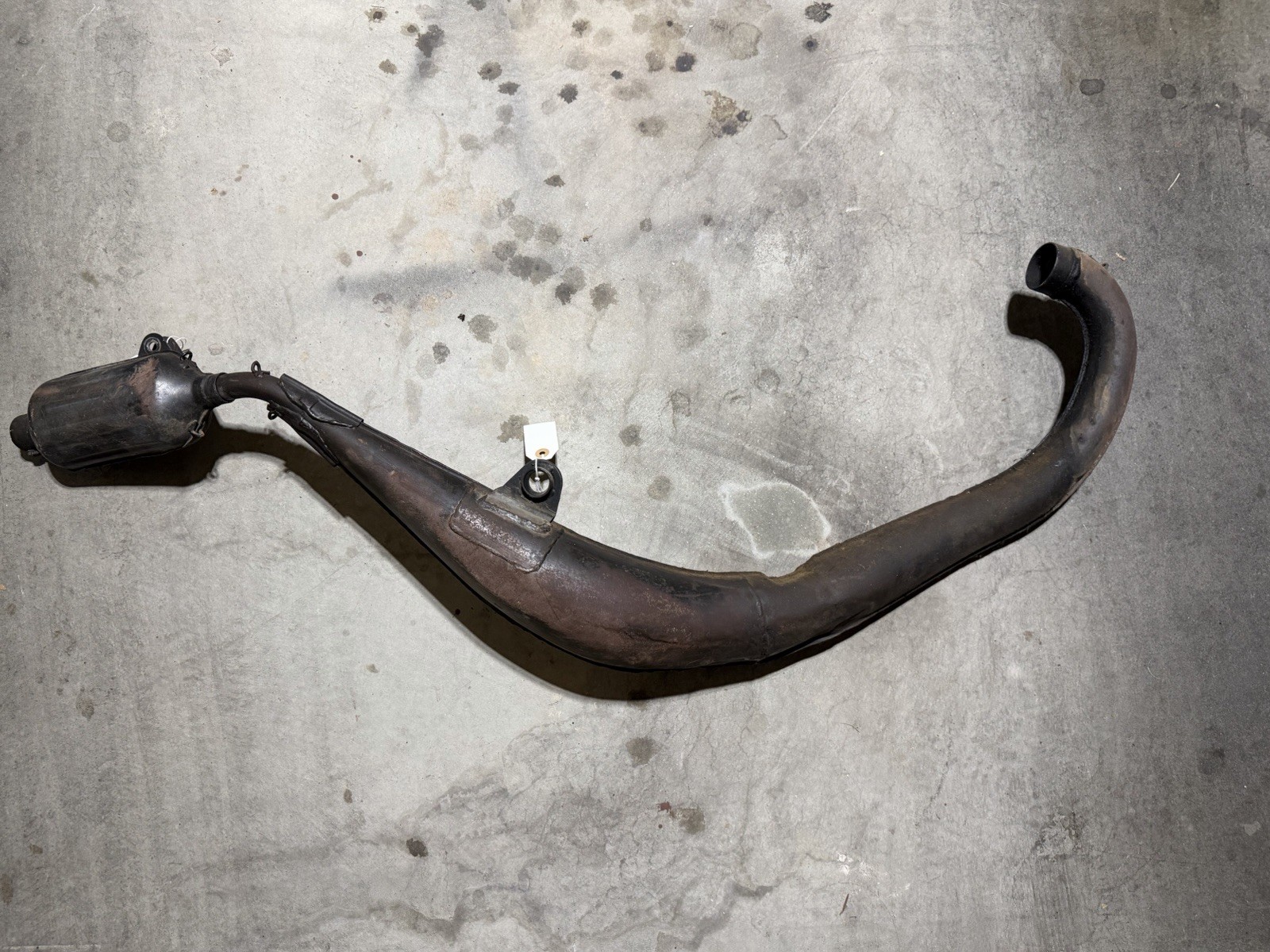 Vintage Repaired OEM Suzuki 1974-1975 TM250 Pipe & Silencer Vintage Repaired OEM Suzuki 1974-1975 TM250 Pipe & Silencer