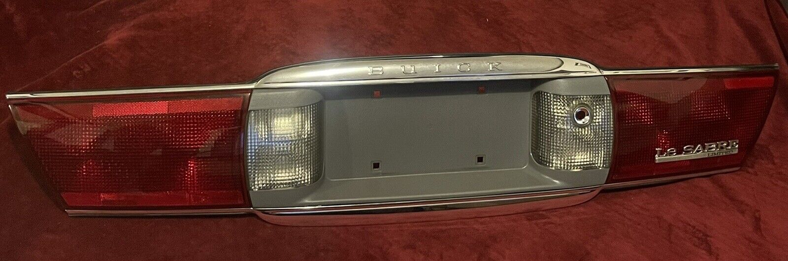 03-05 Buick LeSabre Limited Rear Center Tail Light Panel OEM 16525084